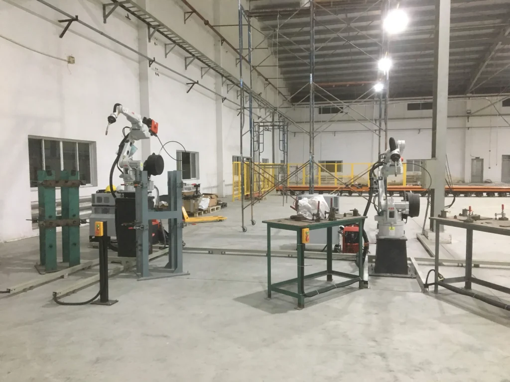 Hệ thống tự động hóa trong sản xuất ngành nhôm kính 3 Hệ thống cánh tay robot hàn công nghiệp tự động